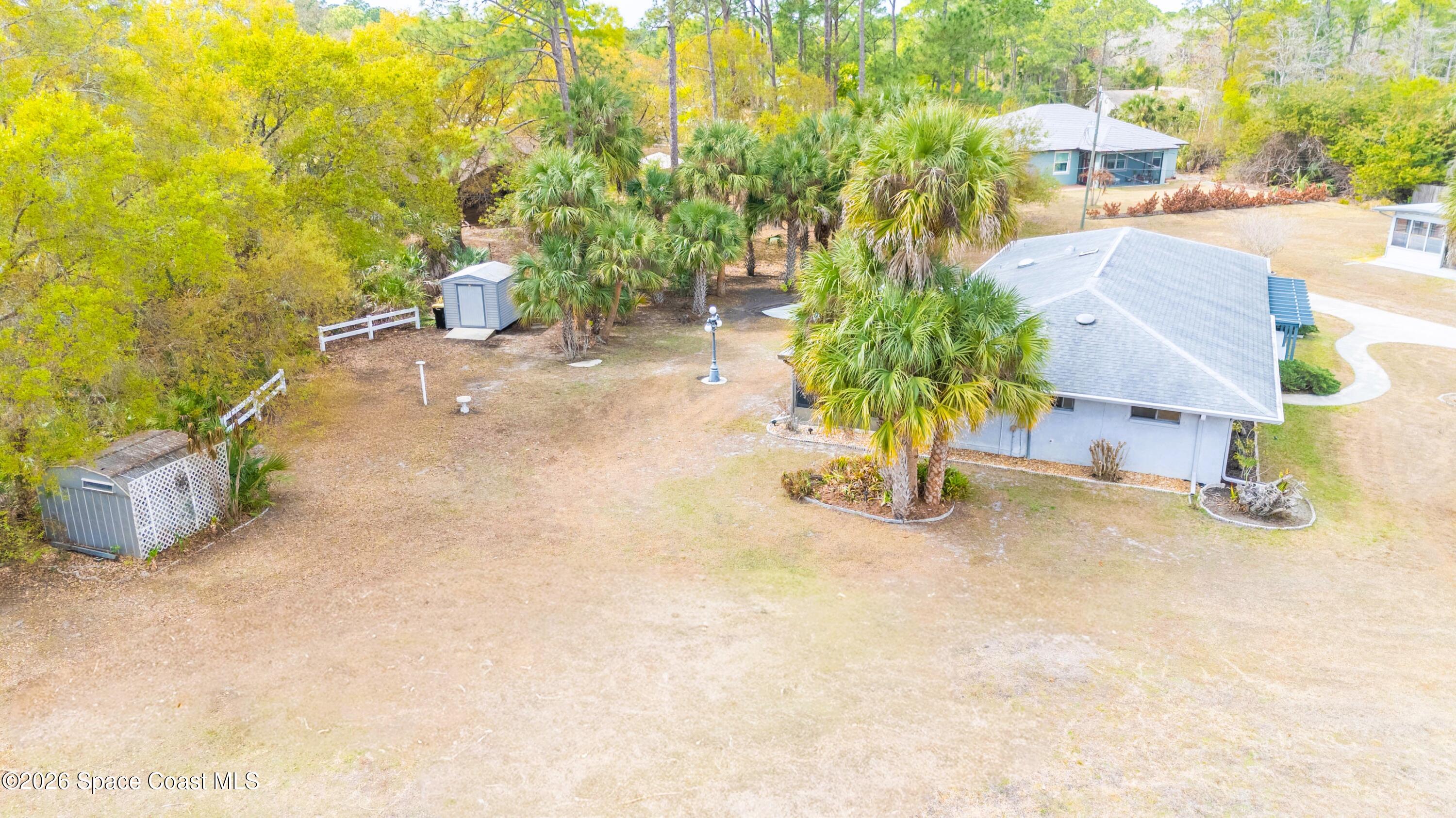 1782 Sand Road Southeast Palm Bay, FL 32909 - Photo 45 of 56 DJI_20260227021516_0262_D_GRACE5K