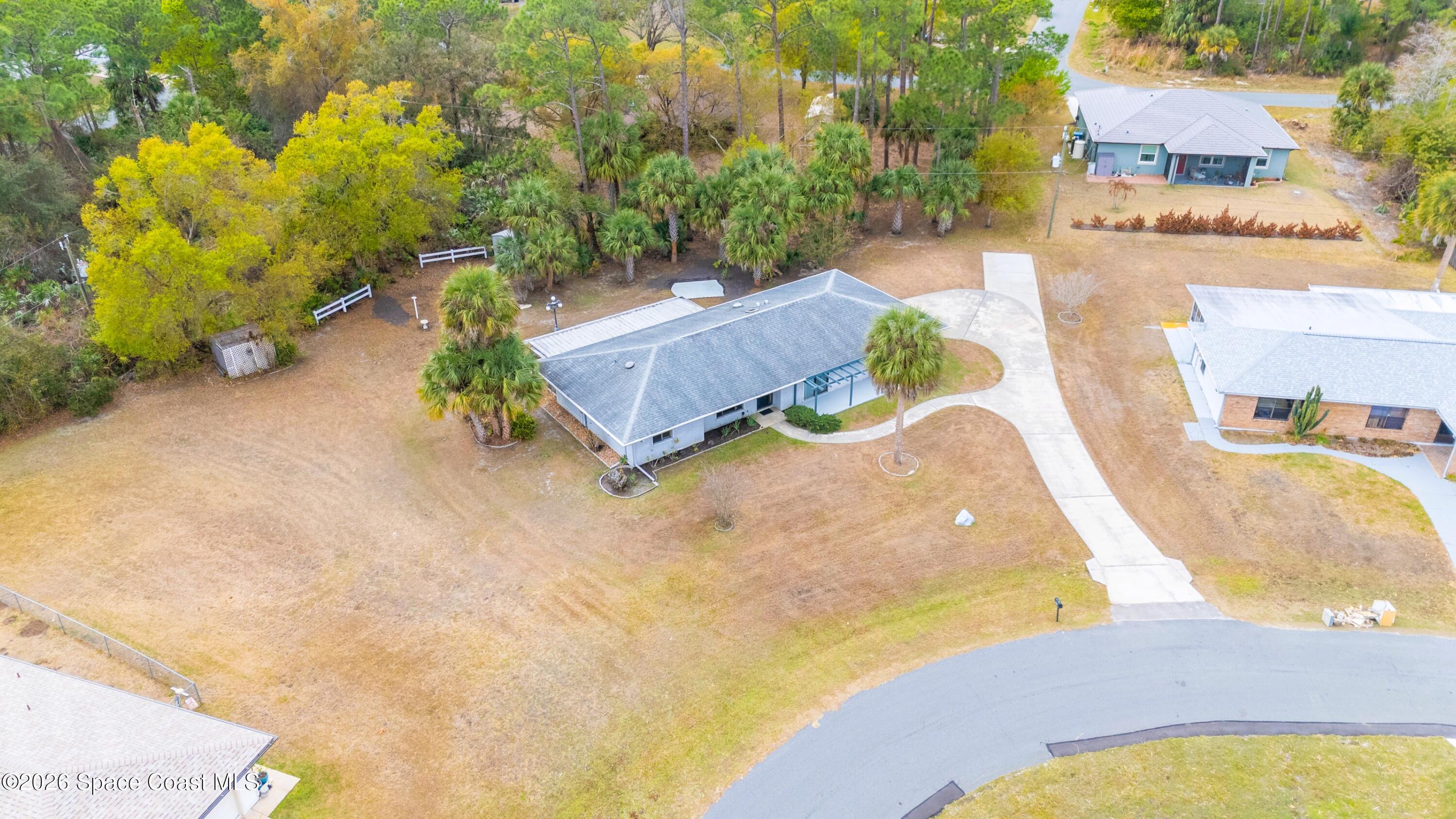 1782 Sand Road Southeast Palm Bay, FL 32909 - Photo 48 of 56 DJI_20260227021408_0260_D_GRACE5K