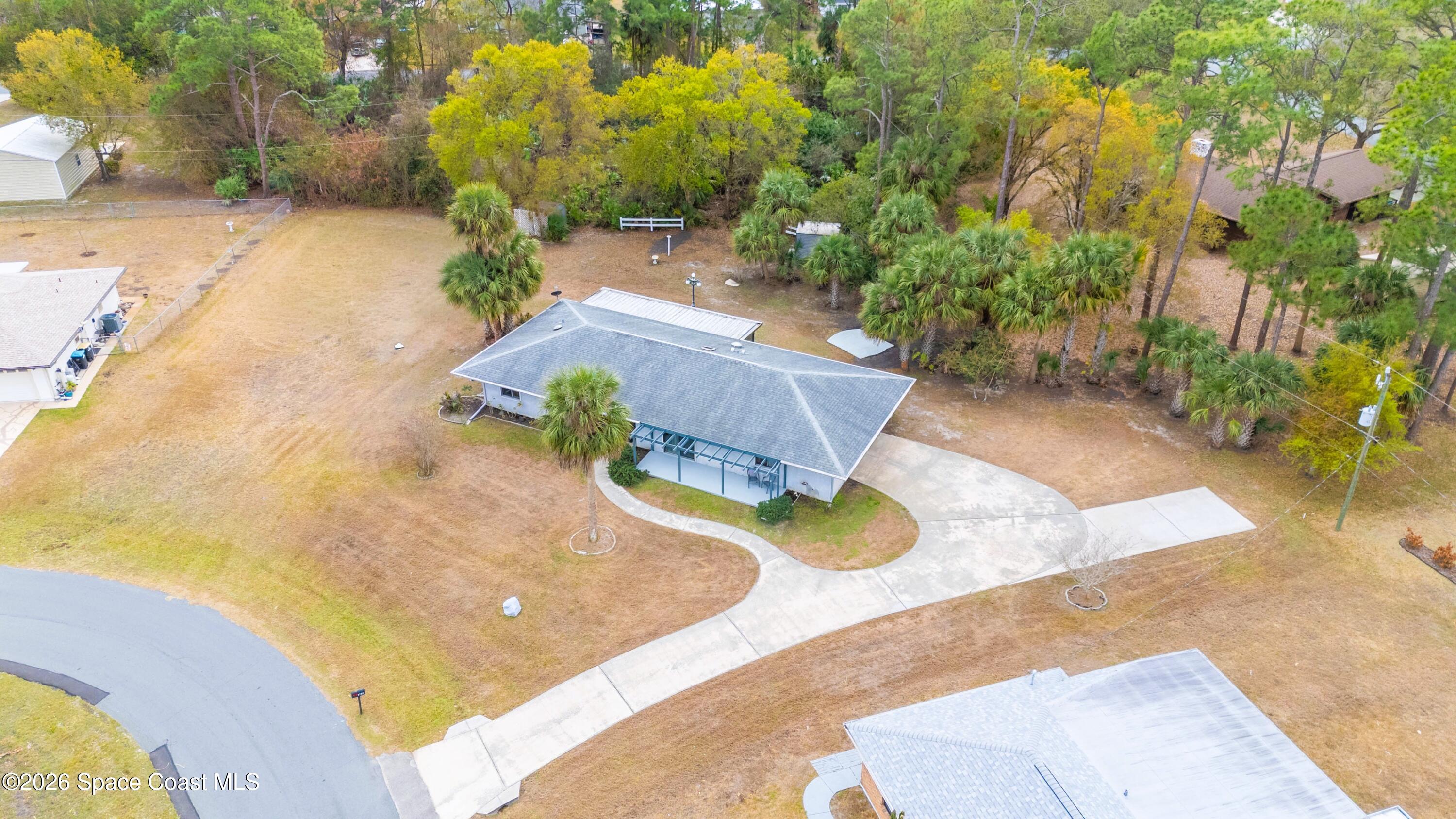 1782 Sand Road Southeast Palm Bay, FL 32909 - Photo 49 of 56 DJI_20260227021500_0261_D_GRACE5K