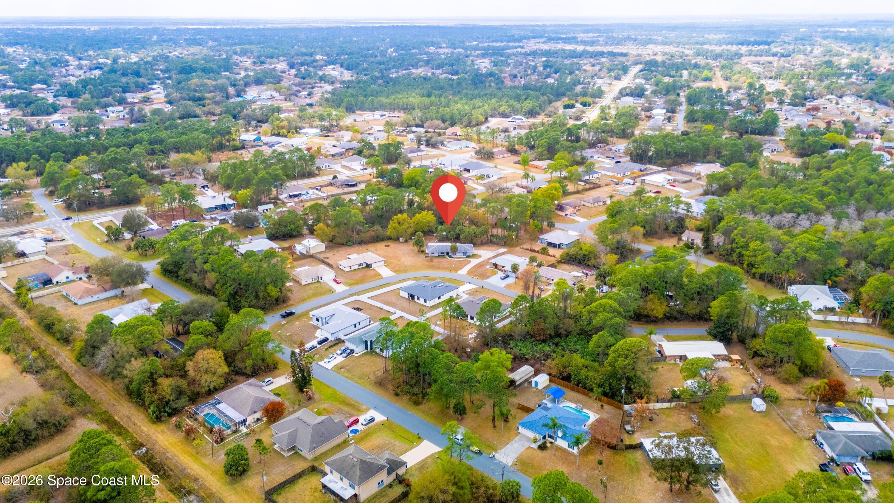1782 Sand Road Southeast Palm Bay, FL 32909 - Photo 53 of 56 DJI_20260227022117_0273_D_GRACE5K