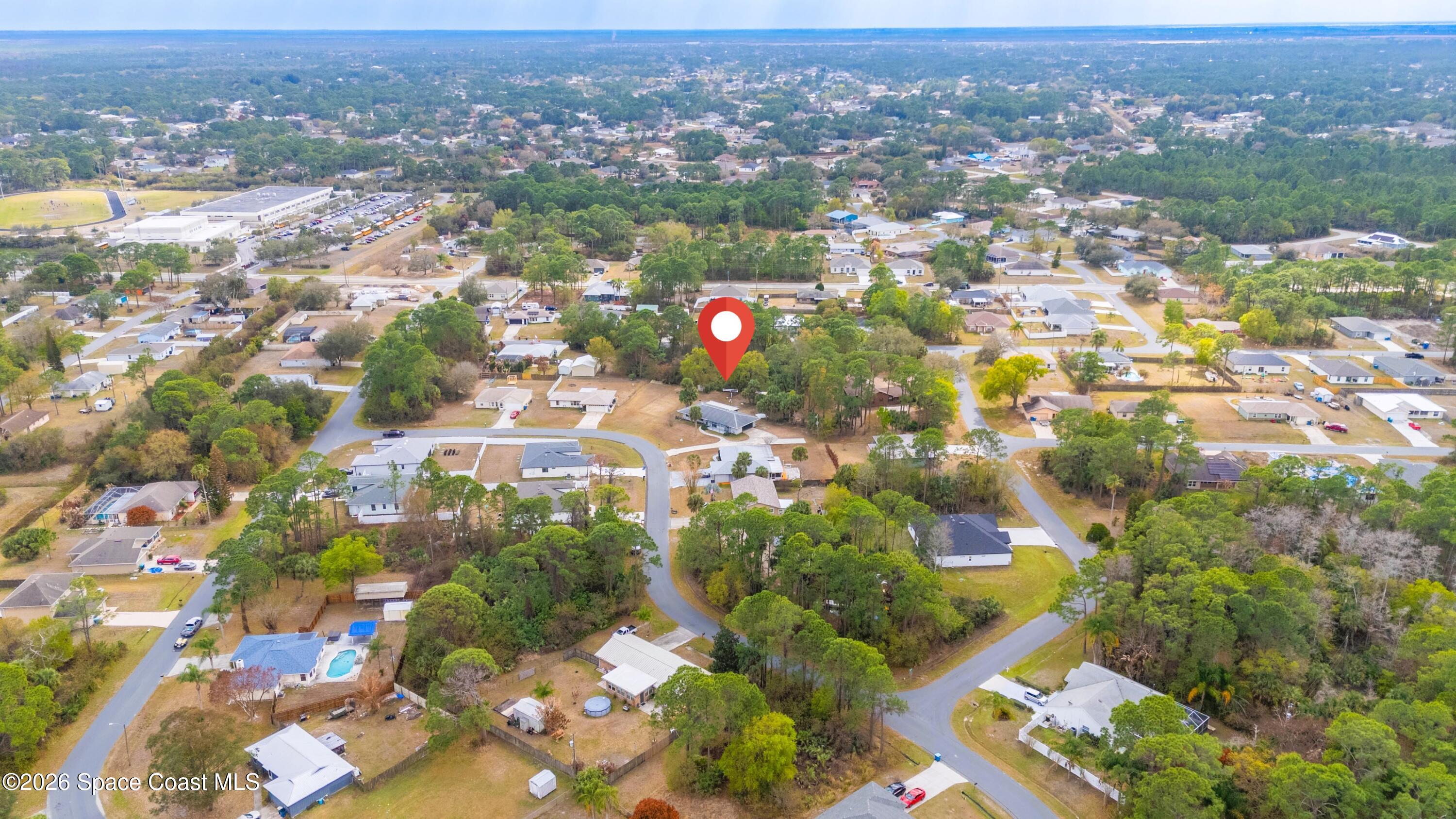 1782 Sand Road Southeast Palm Bay, FL 32909 - Photo 54 of 56 DJI_20260227022141_0274_D_GRACE5K