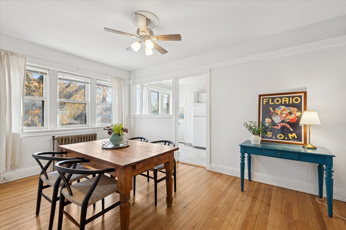 845 Pleasant Street, Unit 3E Oak Park, IL 60302 - Photo 14 of 22 a view of a dining room with furniture window and wooden floor