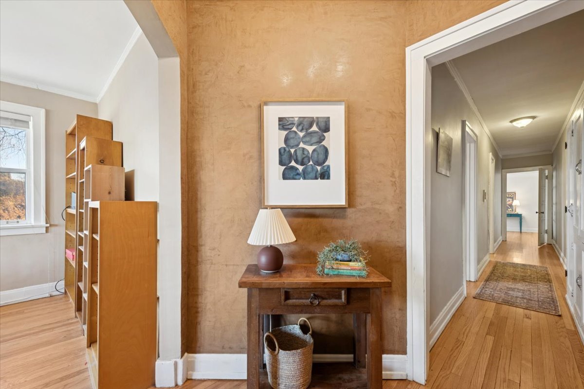 845 Pleasant Street, Unit 3E Oak Park, IL 60302 - Photo 5 of 22 a view of a hallway to a livingroom with furniture
