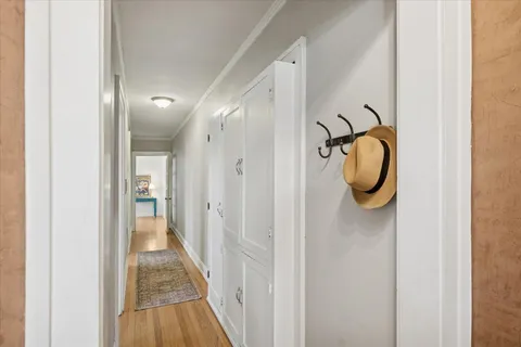 a bathroom with a shower and mirror
