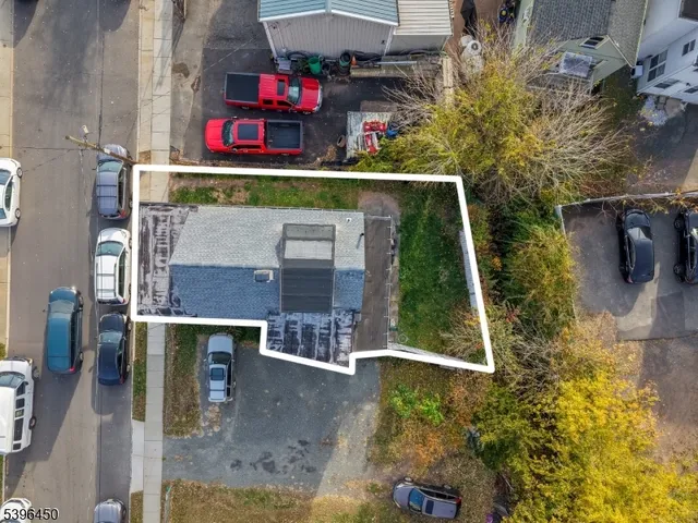 an outdoor space view with two chairs and potted plants