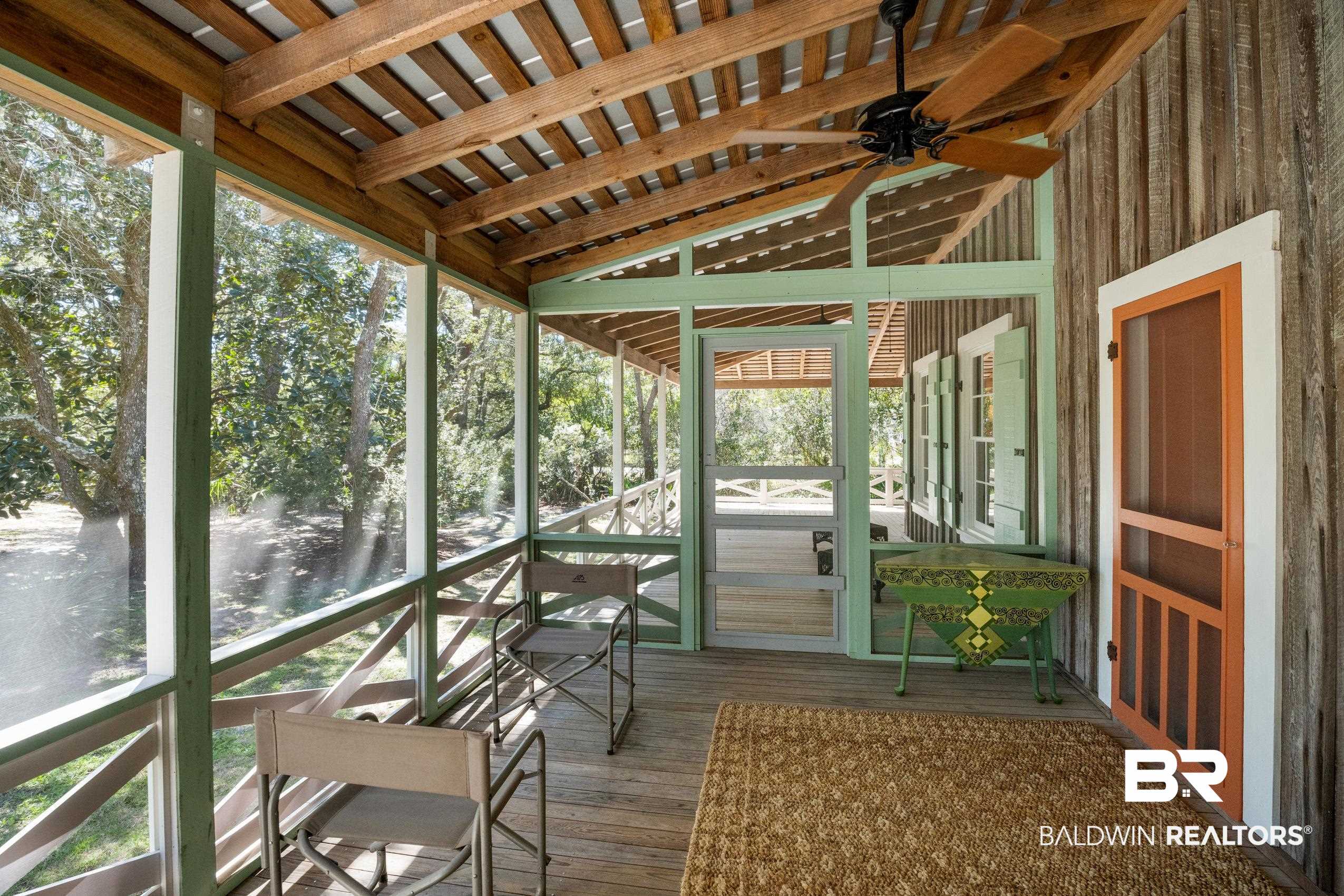 30671 Magnolia Street Elberta, AL 36530 - Photo 15 of 68 Unfurnished sunroom featuring ceiling fan and a healthy amount of sunlight