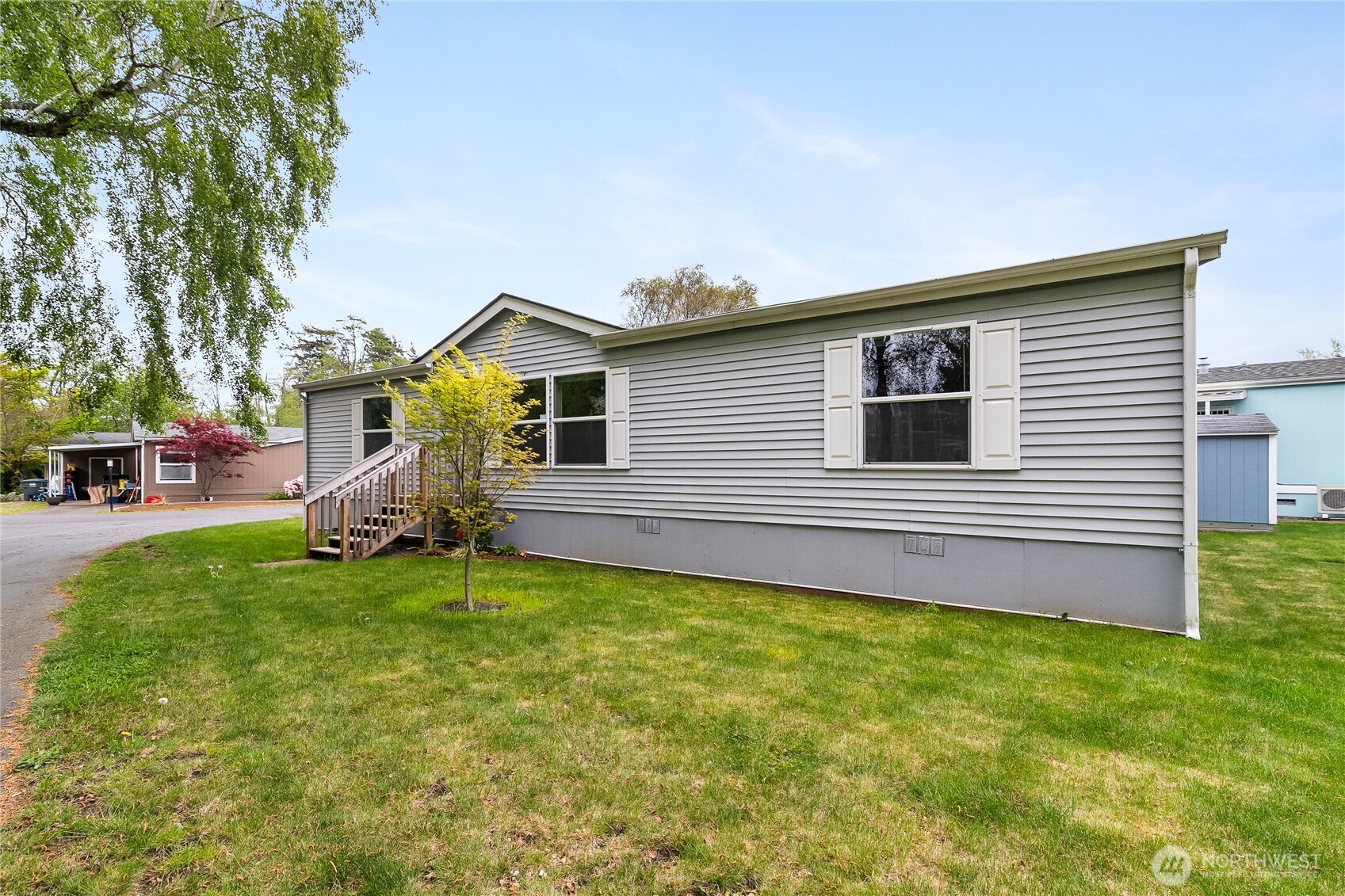 2350 Douglas Road, Unit 30B Ferndale, WA 98248 - Photo 2 of 36 a backyard of a house with seating space