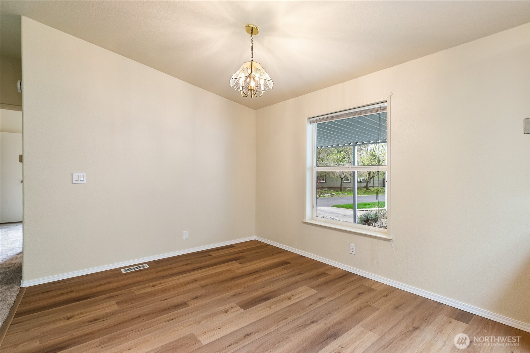 2350 Douglas Road, Unit 30B Ferndale, WA 98248 - Photo 25 of 36 an empty room with wooden floor and windows