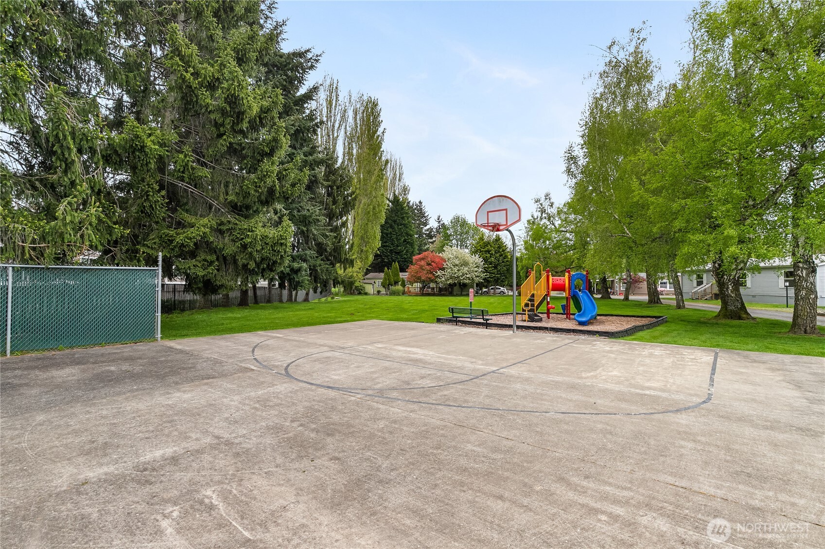 2350 Douglas Road, Unit 30B Ferndale, WA 98248 - Photo 30 of 36 a childrens park with lots of swings and slides