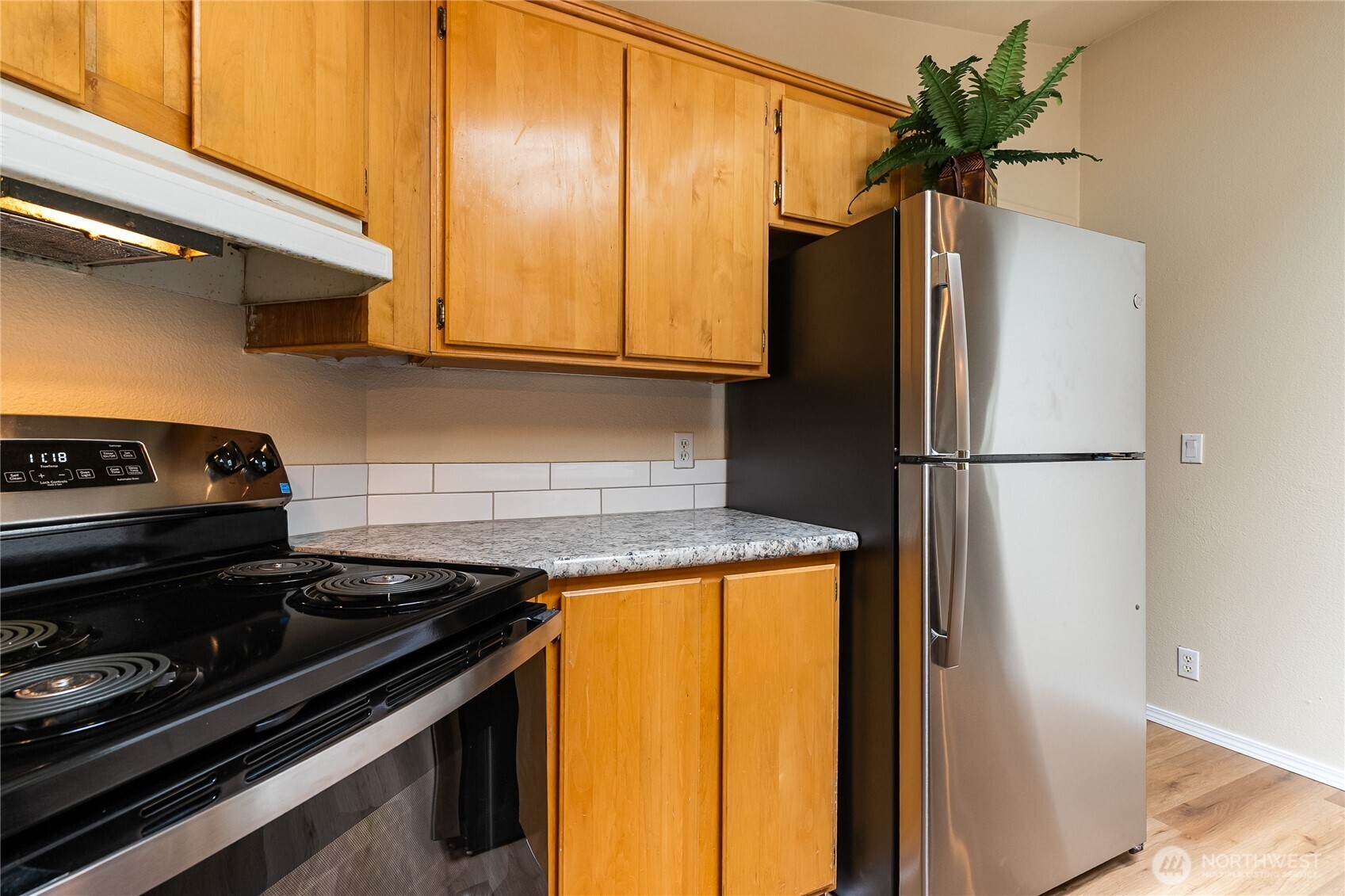 2350 Douglas Road, Unit 30B Ferndale, WA 98248 - Photo 10 of 36 a kitchen with a refrigerator and a stove