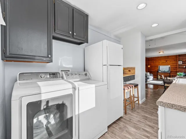 a utility room with dryer and washer