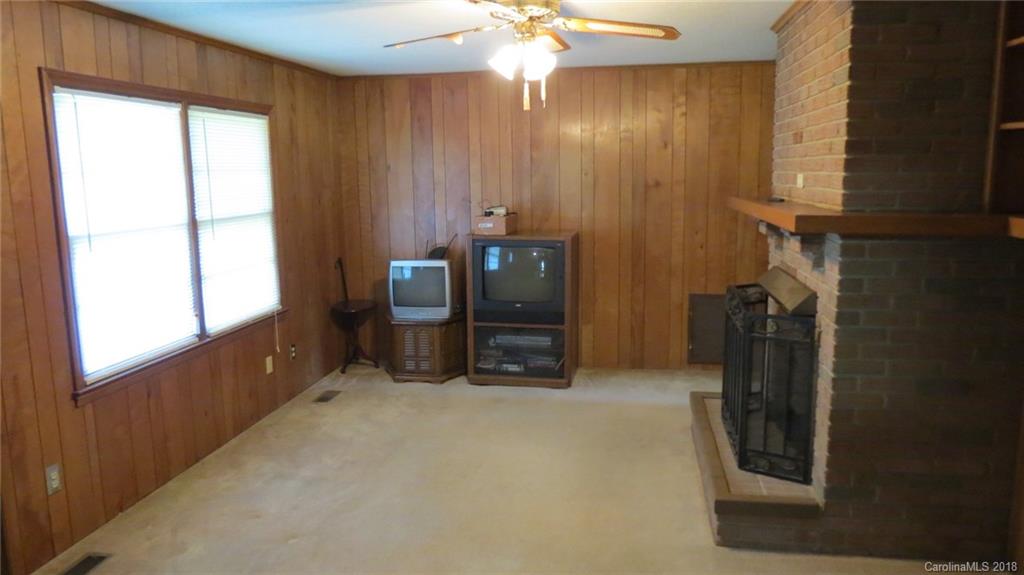 4706 Ridge Road Charlotte, NC 28269 - Photo 11 of 17 a view of an empty room with a window