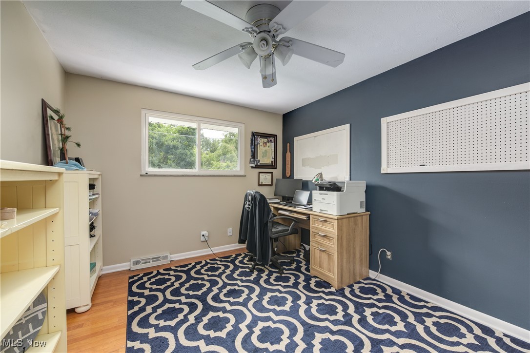13765 Newton Road Cleveland, OH 44130 - Photo 22 of 42 Office area with light wood-style floors and ceiling fan