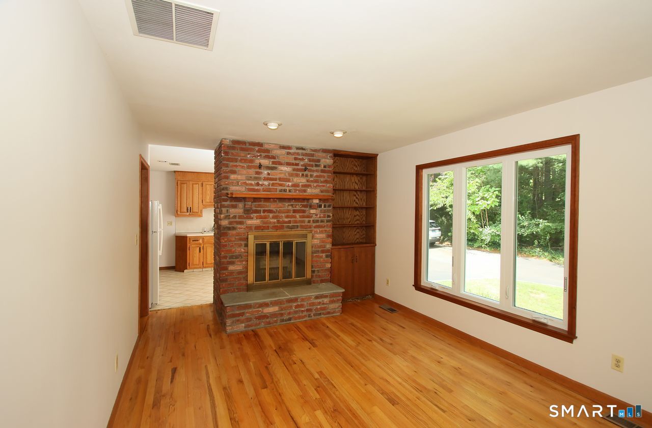 328 Saybrook Road Orange, CT 06477 - Photo 28 of 40 Living Room with fireplace