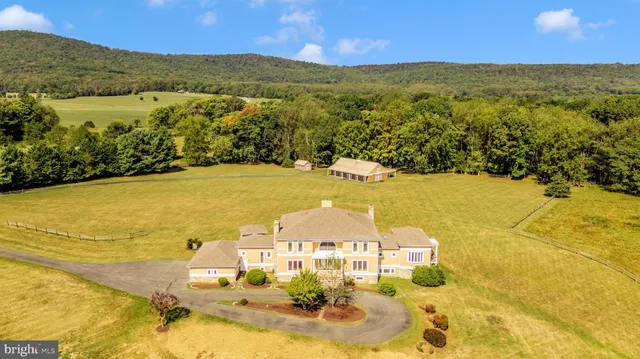 a view of a swimming pool with an ocean view