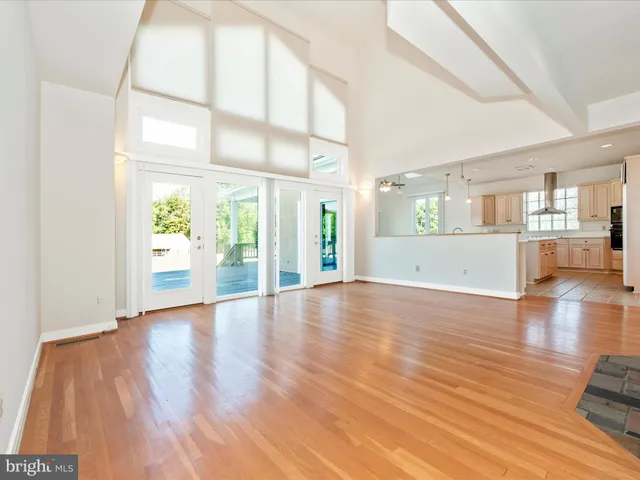 a view of living room with furniture and a fireplace