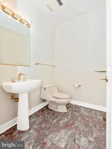 a bathroom with a sink and a toilet