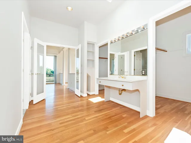 a view of a room with wooden walls