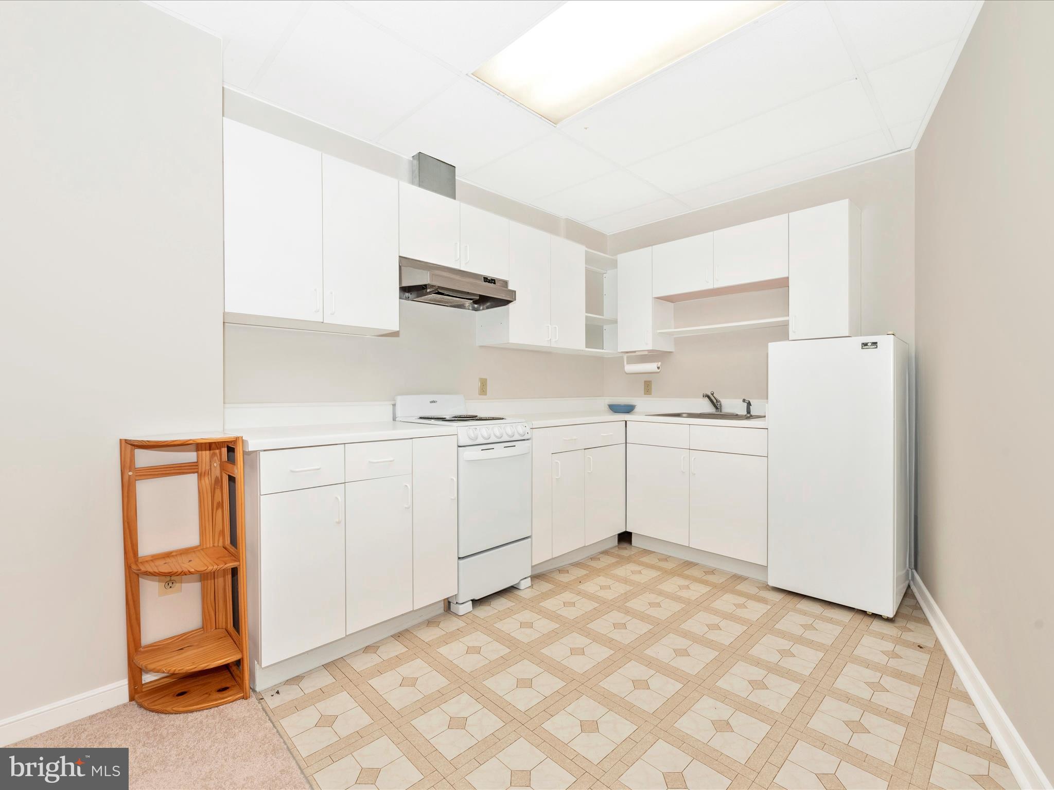 12 Barley Field Court Dickerson, MD 20842 - Photo 62 of 103 a room with white cabinets and white appliances