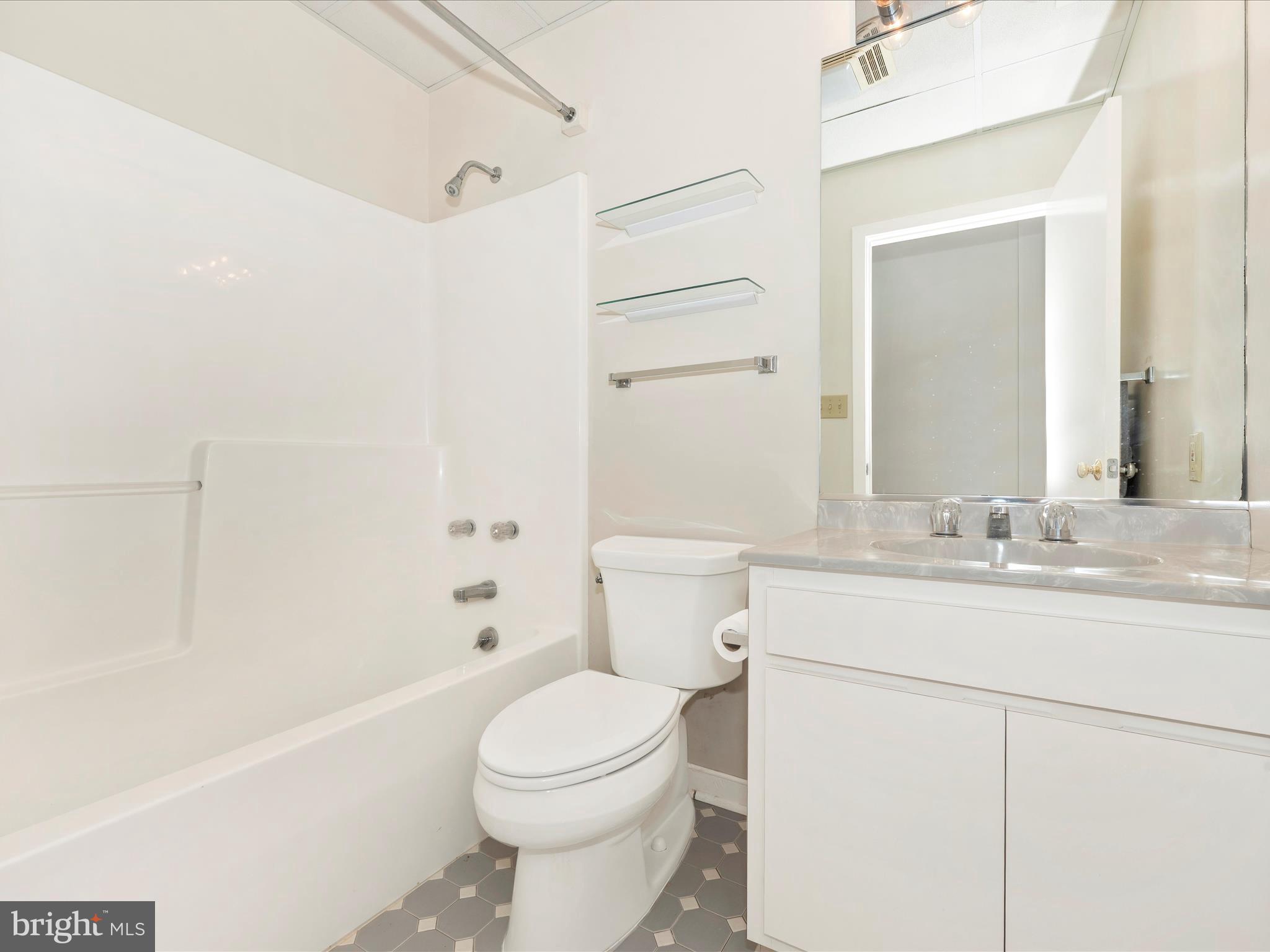 12 Barley Field Court Dickerson, MD 20842 - Photo 70 of 103 a bathroom with a sink a toilet and shower