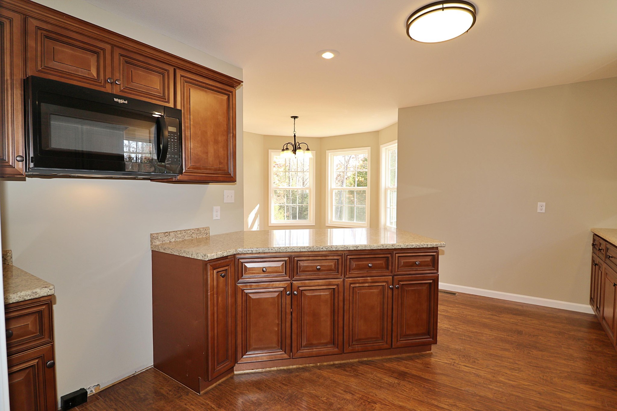 391 Toomey Falls Road Oneida, TN 37841 - Photo 14 of 42 a kitchen with stainless steel appliances granite countertop a sink and a microwave