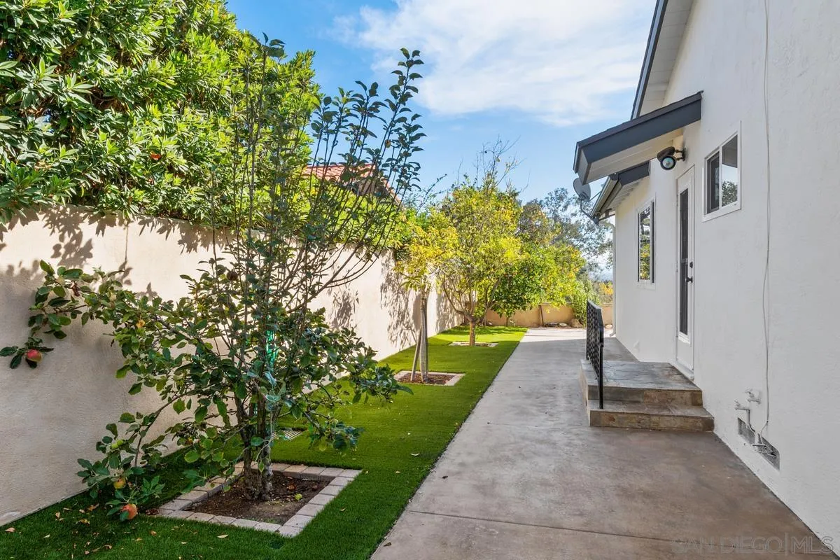 5629 Soledad Road La Jolla, CA 92037 - Photo 37 of 38 a view of a pathway with a yard