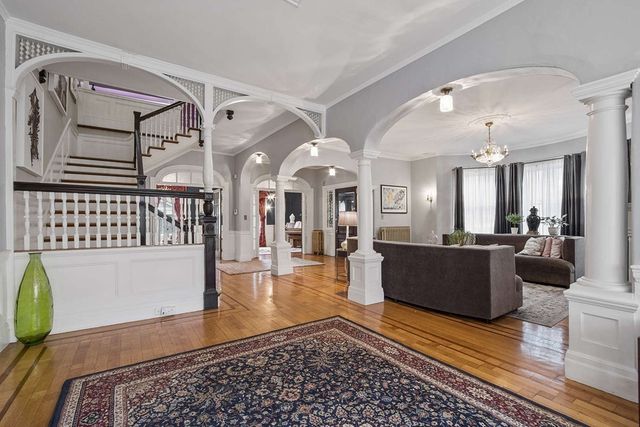 a living room with furniture and a table