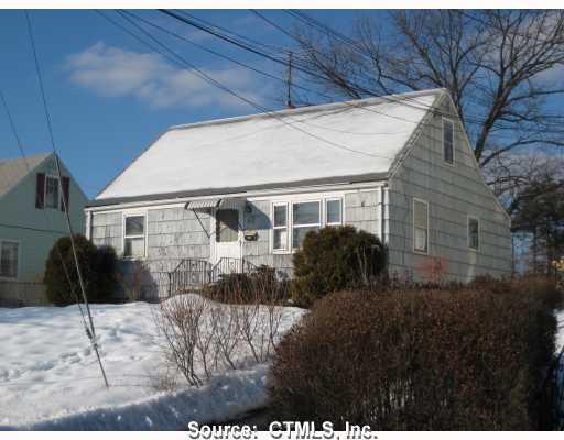 83 Ridgewood Street New Britain, CT 06053 - Photo 1 of 1 a front view of a house with a yard