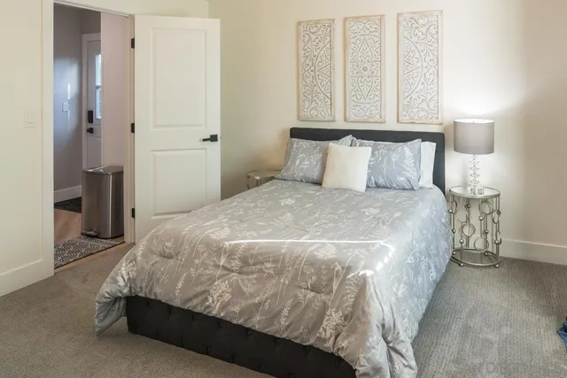 a bathroom with a toilet a sink and a mirror