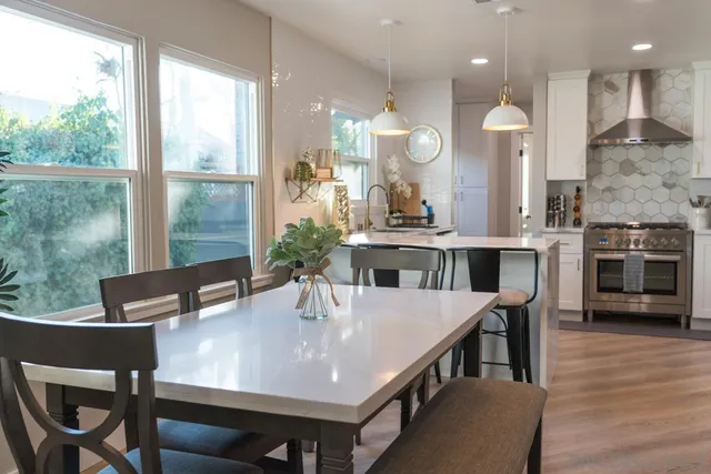 a large bed sitting in a bedroom next to a bathroom