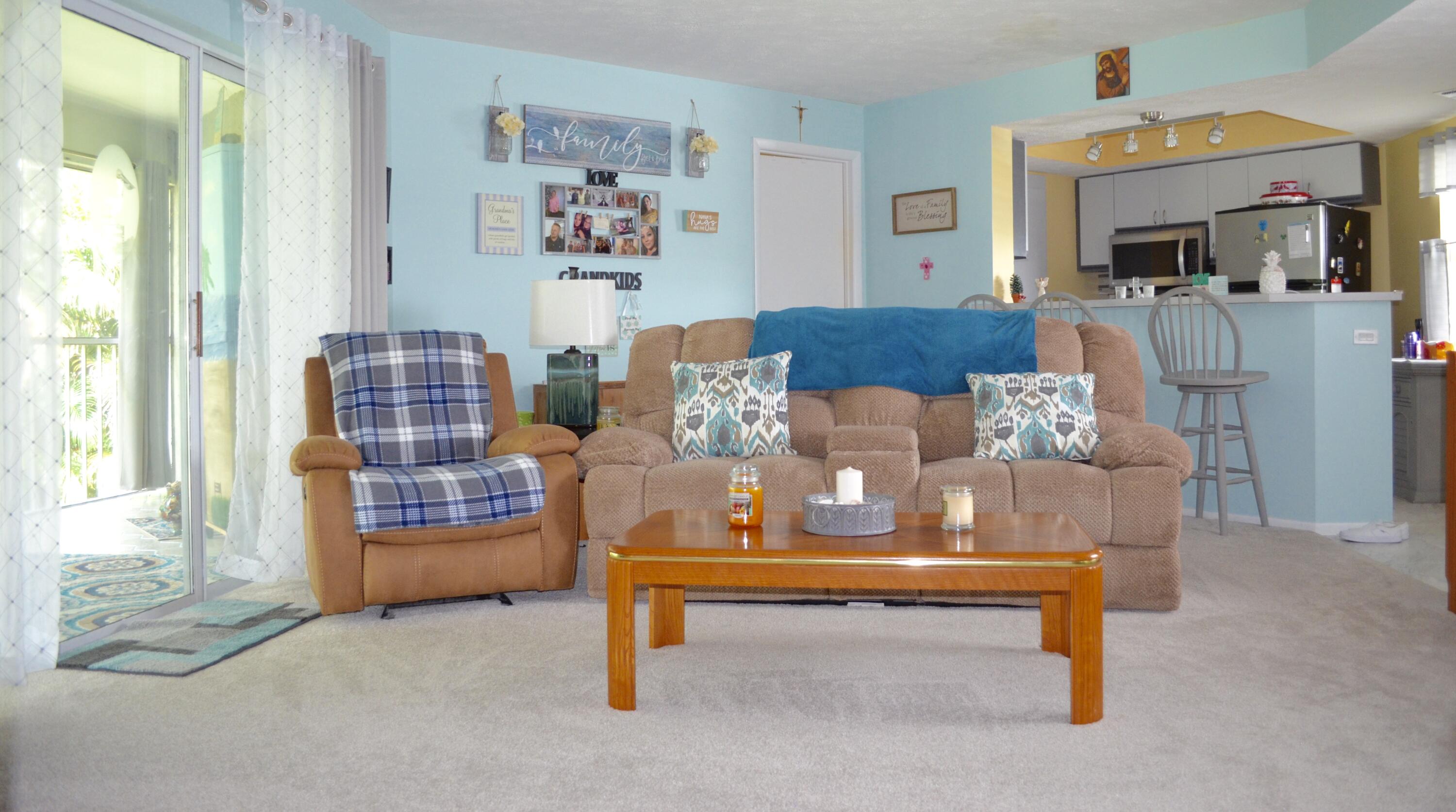 3206 Southeast Aster Lane, Unit 207 Stuart, FL 34994 - Photo 2 of 13 LIVING ROOM