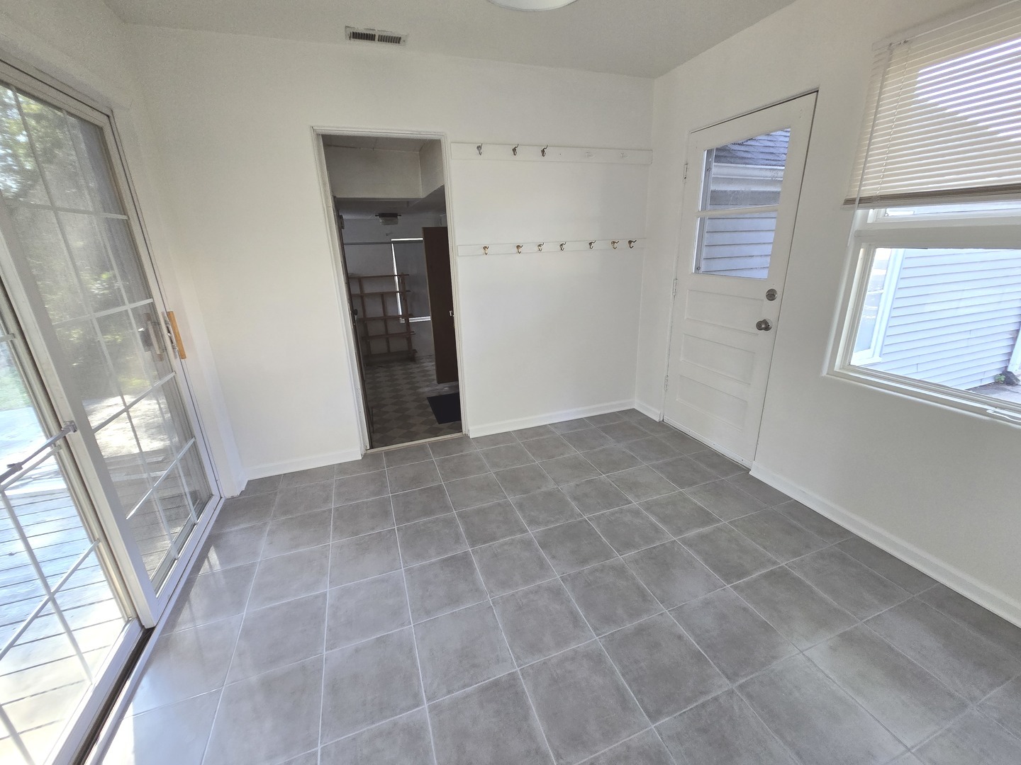 901 East Krage Drive Addison, IL 60101 - Photo 17 of 25 a view of an empty room with a window