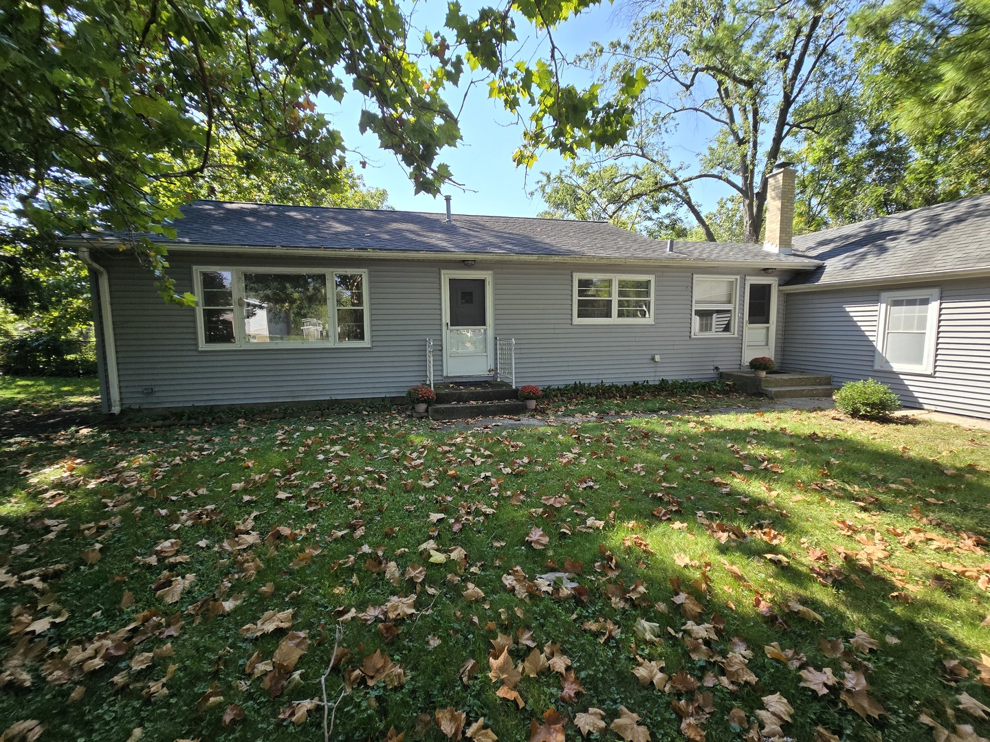 901 East Krage Drive Addison, IL 60101 - Photo 2 of 25 a house that has a tree in front of it