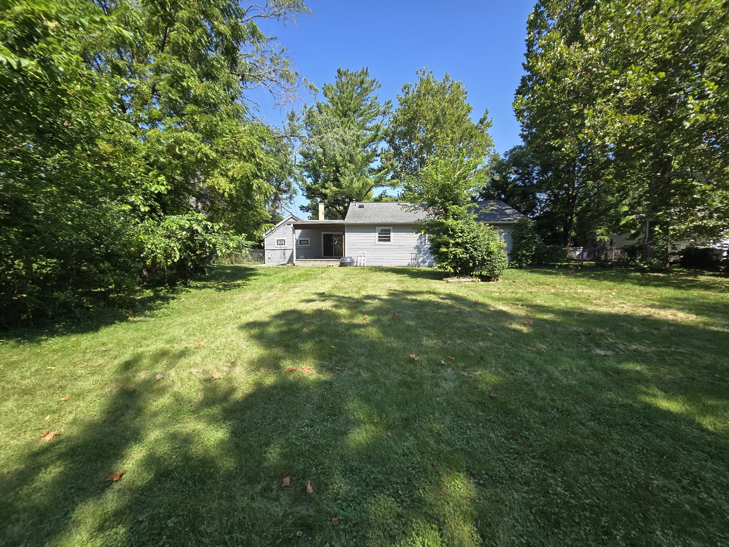 901 East Krage Drive Addison, IL 60101 - Photo 23 of 25 a view of a house with a yard and sitting area