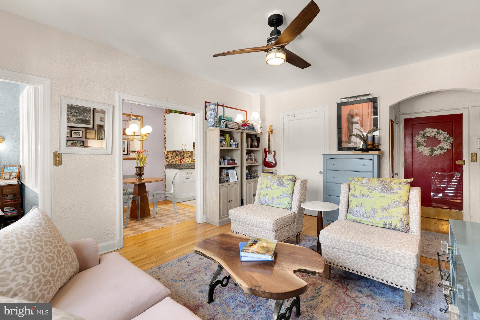 2040 Belmont Road Northwest, Unit 628 Washington, DC 20009 - Photo 5 of 19 a living room with furniture and a wooden floor