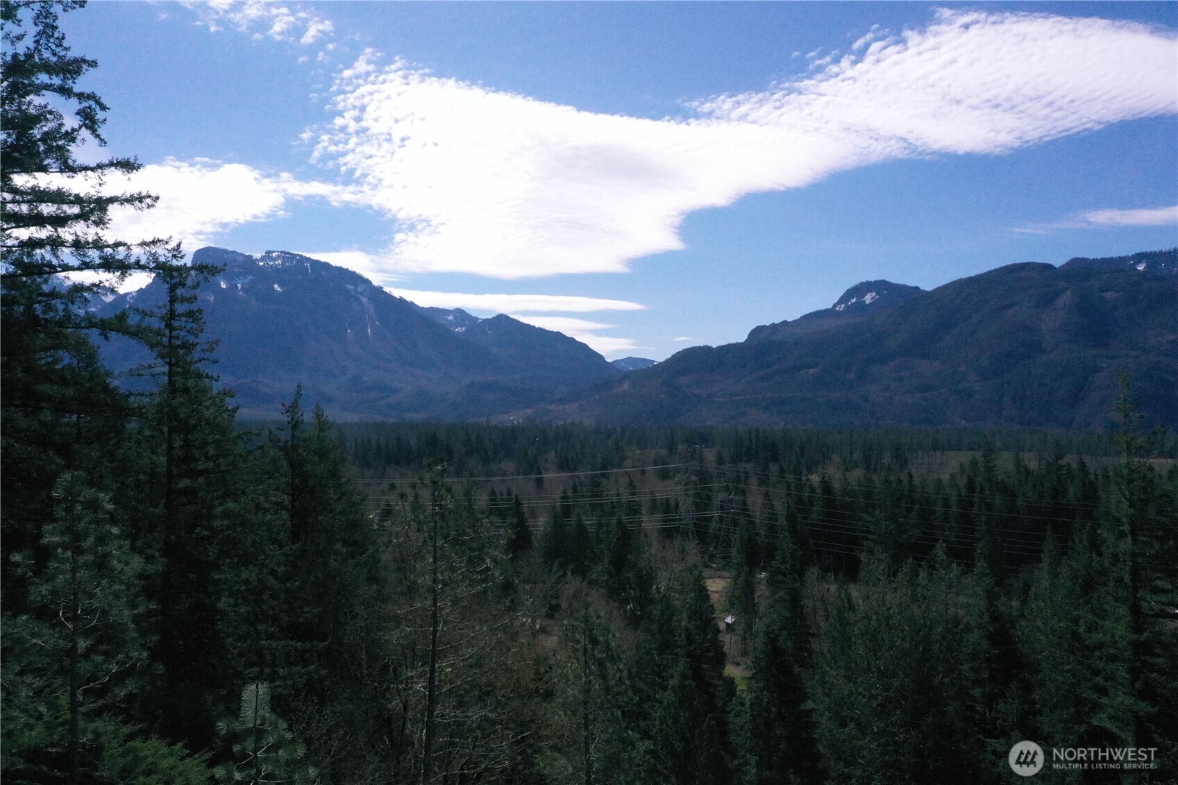 15327 May Creek Road Gold Bar, WA 98251 - Photo 12 of 35 a view of mountains in middle of the green field