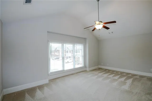a view of empty room with a window