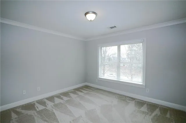 a view of a room with a window