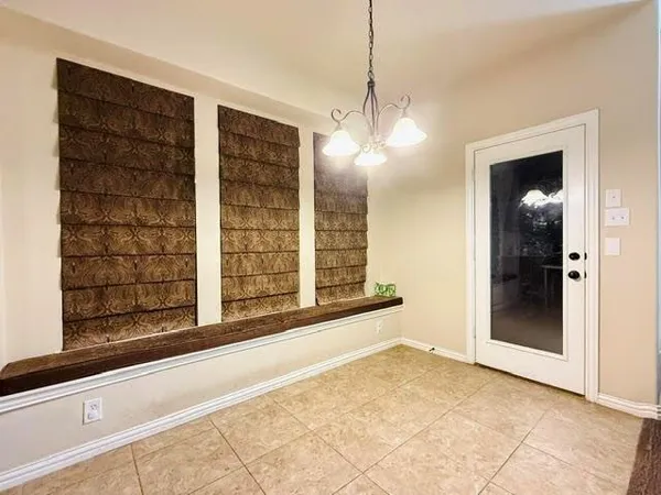 a view of a room with a front door