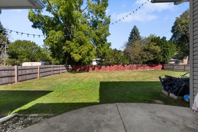 a view of a garden with an outdoor space