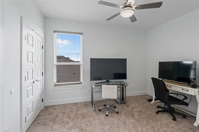 a bedroom with a bed and a closet