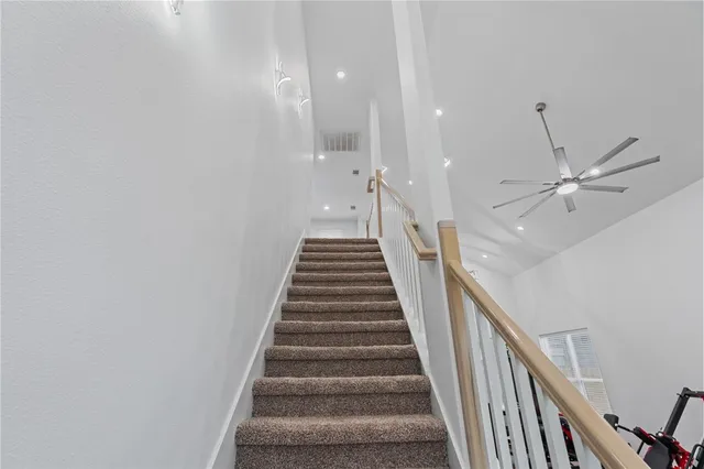 a view of a patio with table and chairs