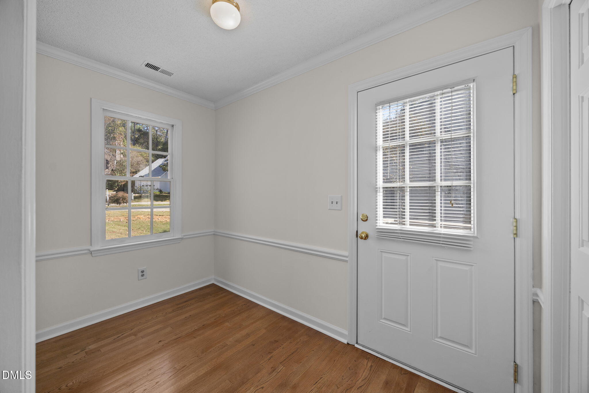 102 Korbel Place Cary, NC 27513 - Photo 18 of 43 an empty room with windows