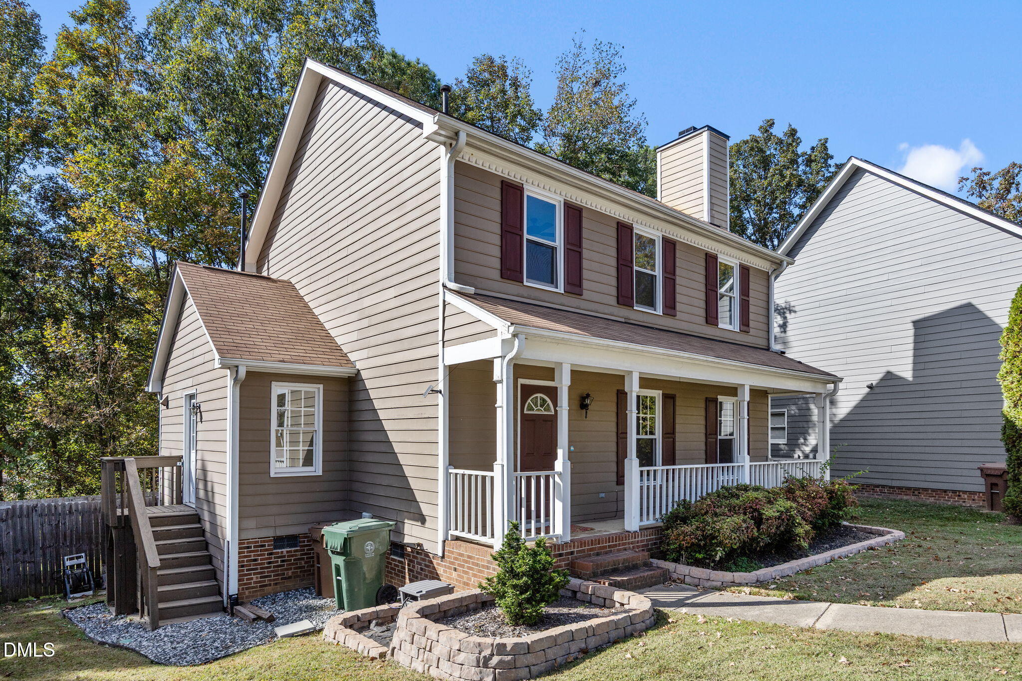 102 Korbel Place Cary, NC 27513 - Photo 2 of 43 a front view of a house with garden