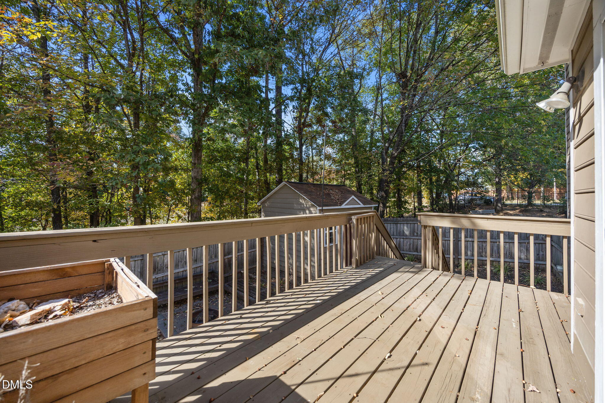 102 Korbel Place Cary, NC 27513 - Photo 30 of 43 a balcony with wooden floor and fence