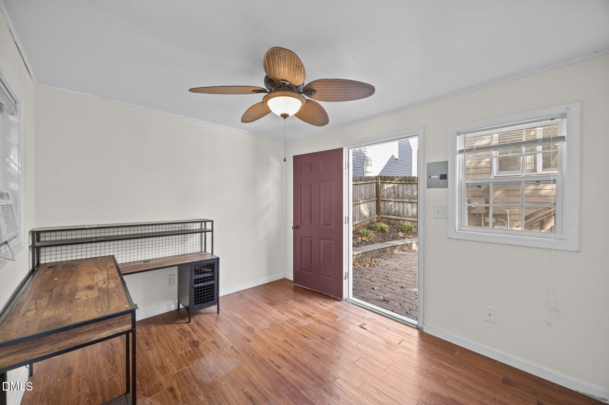 102 Korbel Place Cary, NC 27513 - Photo 33 of 43 a view of an empty room with wooden floor and a window