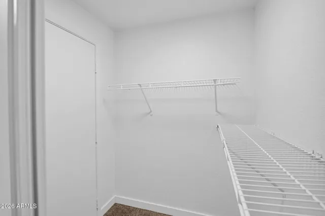 a view of a room with racks on the wall