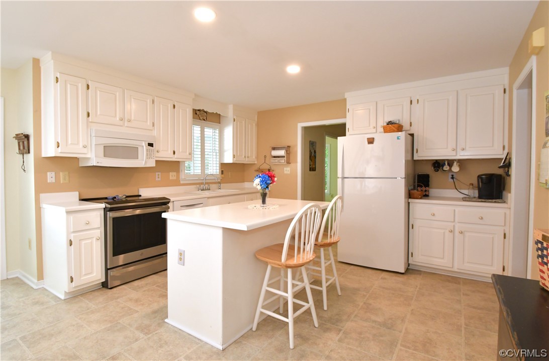 1438 Palmore Road Powhatan, VA 23139 - Photo 12 of 41 Large open kitchen. Island has room for breakfast stools.