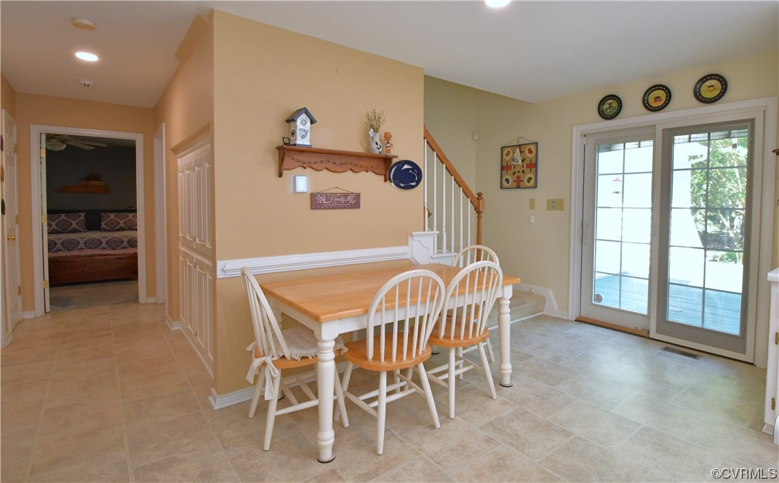 1438 Palmore Road Powhatan, VA 23139 - Photo 13 of 41 Eat in kitchen, 1st floor owners bedroom at end of hallway.