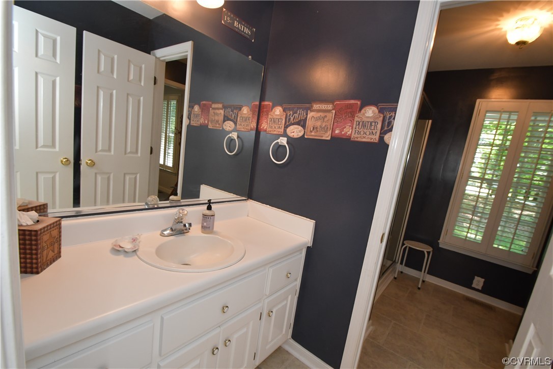 1438 Palmore Road Powhatan, VA 23139 - Photo 17 of 41 Full bath on 1st floor can be entered from kitchen or the owner's bedroom.